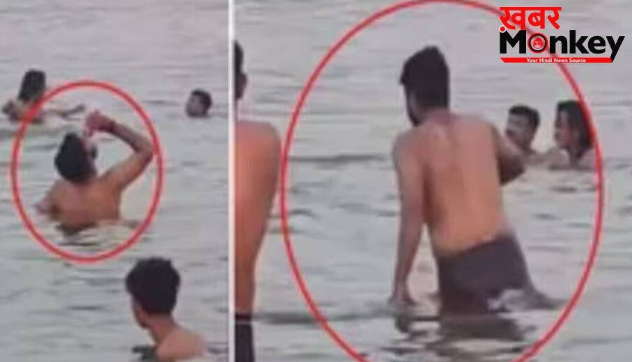 शराब का प्यासा! गंगा में नहाते हुए पी रहा था बीयर, हो गया वायरल, अब केस दर्ज